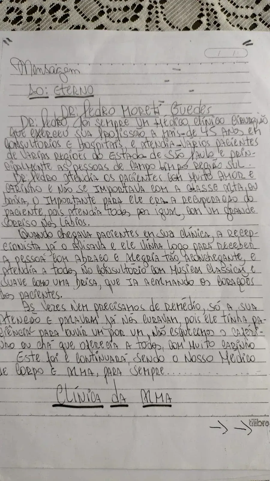 Folha de caderno manuscrita com a "Mensagem ao eterno Dr. Pedro Moretti Guedes", assinada Clínica da Alma